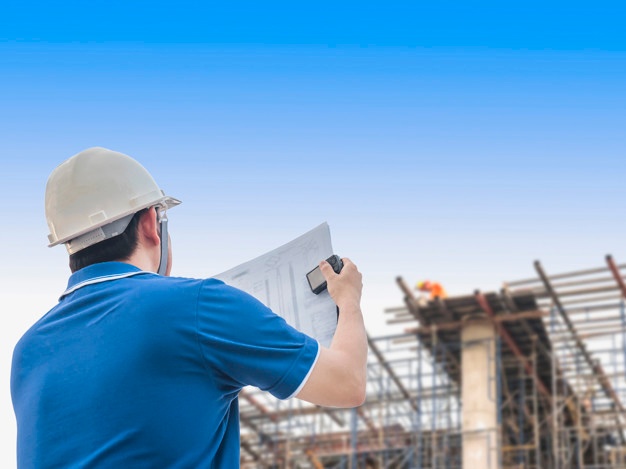 engineer is inspecting his work building construction site 1150 6195